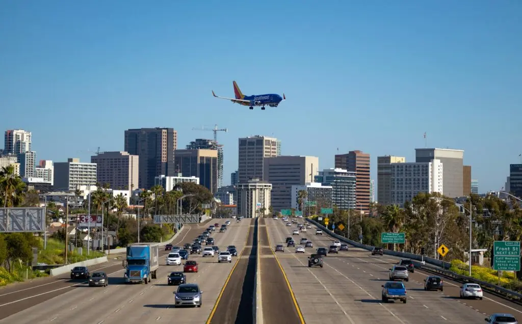 A Southwest plane descending over the I-5 freeway in San Diego, California