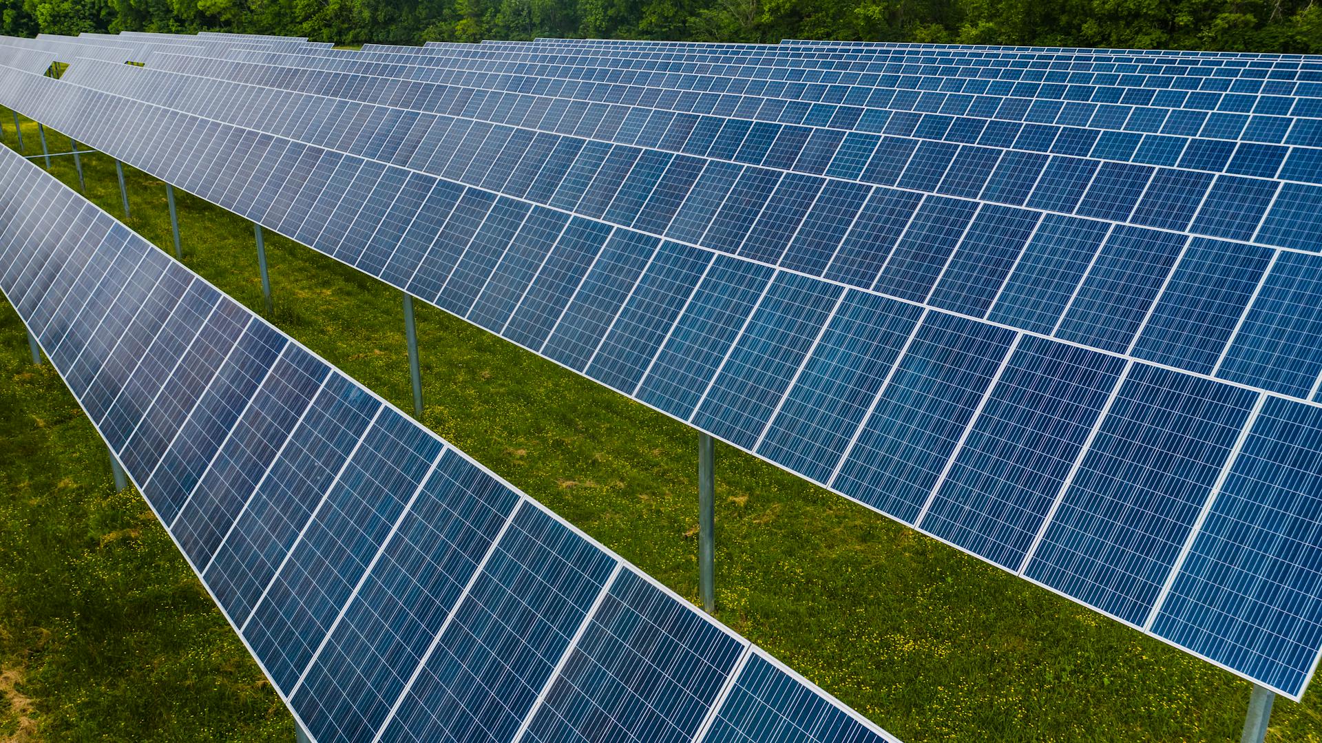 Rows of solar panels on a solar farm