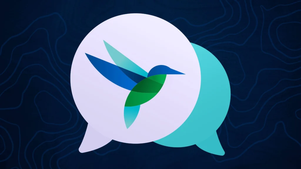 A geometric blue and green hummingbird centered in two overlapping chat bubbles on a dark blue background.
